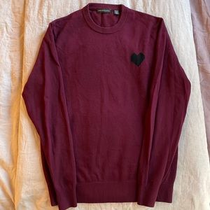 Maroon sweater from Sak’s Fifth Avenue